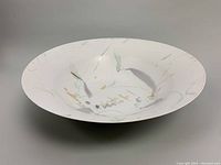 Front view showing full shape and abstract decoration