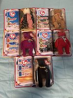 Seven new unopened TY International Mini Beanie Baby Bears in original McDonald's packaging with tags and inserts