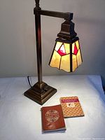 Front view of lamp with two books