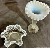 Photo showing the ruffled hobnail bowl and ruffled vase together, highlighting the white opalescent glass fading and condition.
