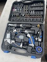Full open view of Mastercraft air tool kit showing tools and accessories arranged in molded case