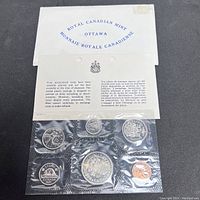 Front view of the packaged 1971 uncirculated Canadian coin set, showing all coins sealed in plastic with Royal Canadian Mint branding and information insert.