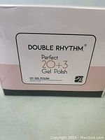 Front of the box showing "DOUBLE RHYTHM Perfect 20+3 Gel Polish UV GEL POLISH" with brand logo.