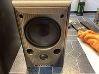 Front view of one speaker showing midrange/bass driver and tweeter with the Mission logo below