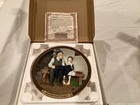 Porcelain figurine with Certificate of Authenticity inside original open box, showing detailed scene of the lighthouse keeper and his daughter.