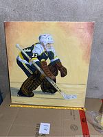 Full view of square canvas painting featuring hockey goalie with vintage goalie equipment and jersey.