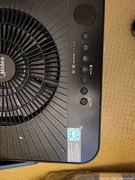 Top fan grill and control panel of the Midea dehumidifier.