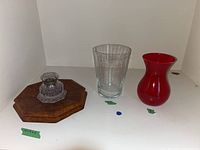 Full lot including ink stand with glass inkwell and two glass vases, one clear and one red