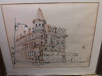 Framed architectural watercolor and ink sketch showing detailed corner building with turret, street lamp, and scaffolding, artist signed Welling.