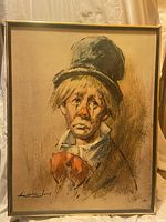 Front view of the framed print showing the clown portrait with artist signature.