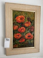 Full view of the framed original oil painting featuring red poppies on masonite board, signed by Ann McCready.