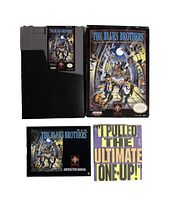 Full game lot showing the NES cartridge, box, instruction manual, and promotional pamphlet.