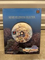 Front of original blue box with Legends of Mana disc embedded in packaging and game artwork.