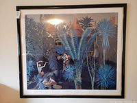 Full view of framed print showing artwork, mat and black frame