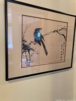 Framed original ink painting showing bird on a branch and calligraphy.