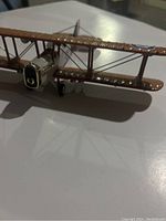 Close-up of Airco DH4 diecast model showing front and bottom wing.
