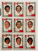 Front view of nine 1972-73 O-Pee-Chee Team Canada hockey cards showing player portraits and decorative borders with Canadian and Soviet flags.
