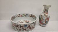 Overview of two-piece lot: round bowl with deer motif and tall vase with figure decoration