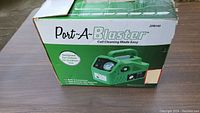Box for Port-A-Blaster ZPB140 coil cleaning machine showing product branding and labeling