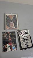 Photo showing Michael Jordan card above two other cards including a Scottie Pippen card and an Inket Trading Cards box