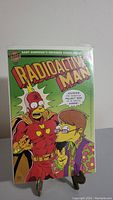 Comic book front cover clearly showing Radioactive Man #216 with characters and title