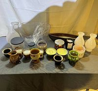 Full lot showing bowl, mugs, candles, and covers