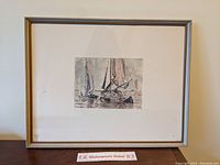 Framed and matted marine scene print by Eugene Boudin showing overall presentation with frame and matting.