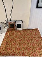 Pair of unopened Ralph Lauren pillow shams with decorative red and gold pattern fabric, along with the Waterford crystal frame packaging visible.