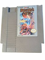 Photo of NES game cartridge Castlevania III Dracula's Curse with label artwork, showing front of cartridge.