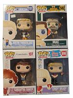Photo showing four Funko Pop vinyl figures in original boxes, arranged in two rows of two. Figures include N'Sync Justin Timberlake, Super Troopers Mac, 16 Candles Samantha Baker, and Brady Bunch Cindy Brady.