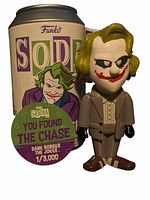 Front view of the collectible vinyl figure of The Joker chase variant next to its original Funko Soda can showing the 'You Found The Chase' sticker and artwork.