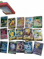 Photo showing 17 jumbo Pokemon cards in a group, some in English and some Japanese, showcasing a variety of popular Pokemon characters and full art designs.