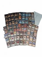 Spread of various Magic: The Gathering Vision set cards arranged facing up, showing card art and details in multiple colors.