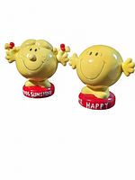 Front view photo showing both Mrs. Sunshine and Mr. Happy piggy banks side by side, highlighting their facial features and bases with names