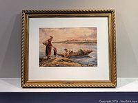 Framed antique watercolour painting showing full gold-toned frame and artwork.
