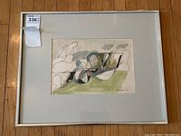 Framed watercolor and ink painting with white mat and silver-tone metal frame