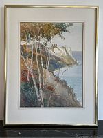 Full view of framed watercolour painting showing composition, frame and matting