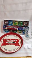 Photo showing the lot contents including the vintage Rheingold Extra Dry metal serving tray, the Molson Golden Ale glass beer mug, and the new in box Beer Cap Stringlights.