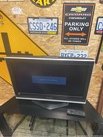 32-inch Panasonic flat screen TV displayed on a black surface with the remote control beside it. The TV screen shows 'Channel not available.'