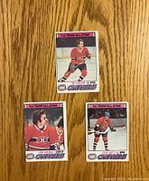 Fronts of three 1977-78 O-Pee-Chee Montreal Canadiens cards featuring Guy Lafleur, Ken Dryden, and Steve Shutt with 1st Team All-Star designation.