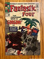 Front cover of the Fantastic Four #44 comic book showing main characters and villain Gorgon in action scene.