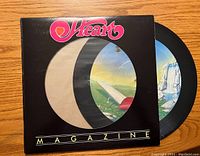 Front of the vinyl record sleeve showing the Heart band logo, and album title 'Magazine' with a circular cutout showing part of the record label artwork.