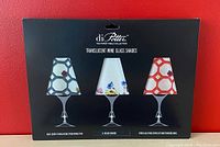 Front view of retail box showing three wine glass shades with different wildflower patterns.