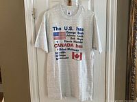 Full view of the vintage political T-shirt showing the complete front graphic design.