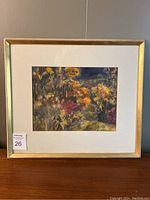 Overall front view of framed painting showing autumn scene