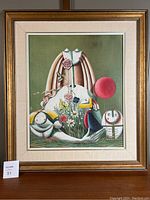 Frontal view of framed painting on table