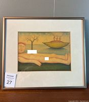 Frontal view of entire framed coloured pencil drawing on tabletop