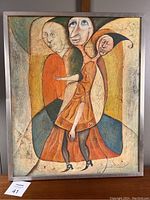 Full view of the framed oil on canvas board showing three abstract figures with stylized faces and earth tone color palette