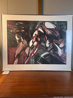 Framed mixed media artwork showing full front view with minimal reflections on glass.