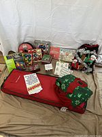 Overview of all holiday items including wrapping station, sweaters, puzzle, ornaments, and lights.